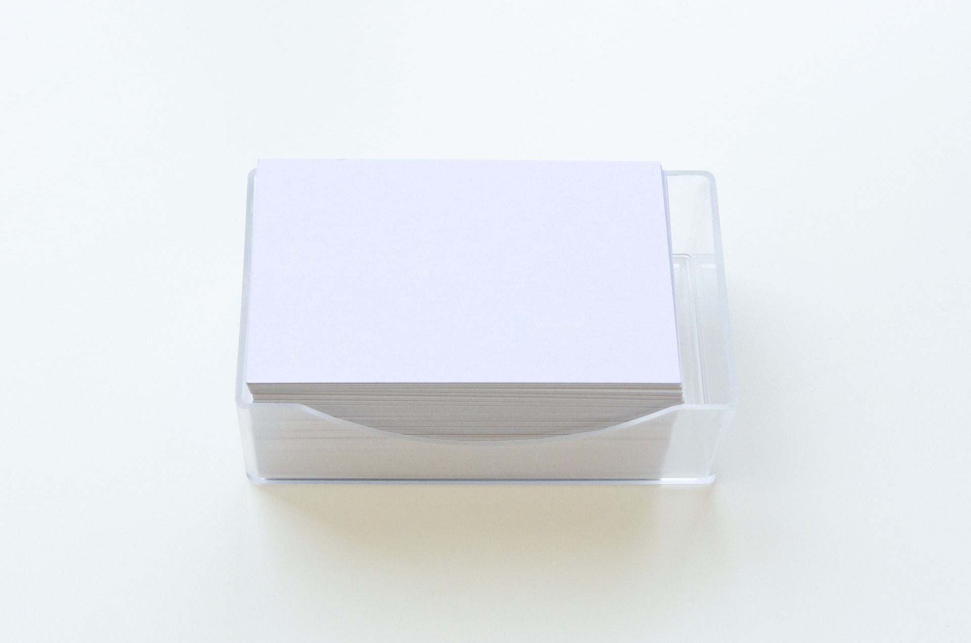 A custom business card holder is a practical and personalized gift.